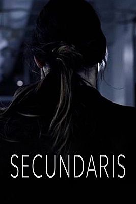 A woman with a long, low ponytail, seen from behind in the dark.